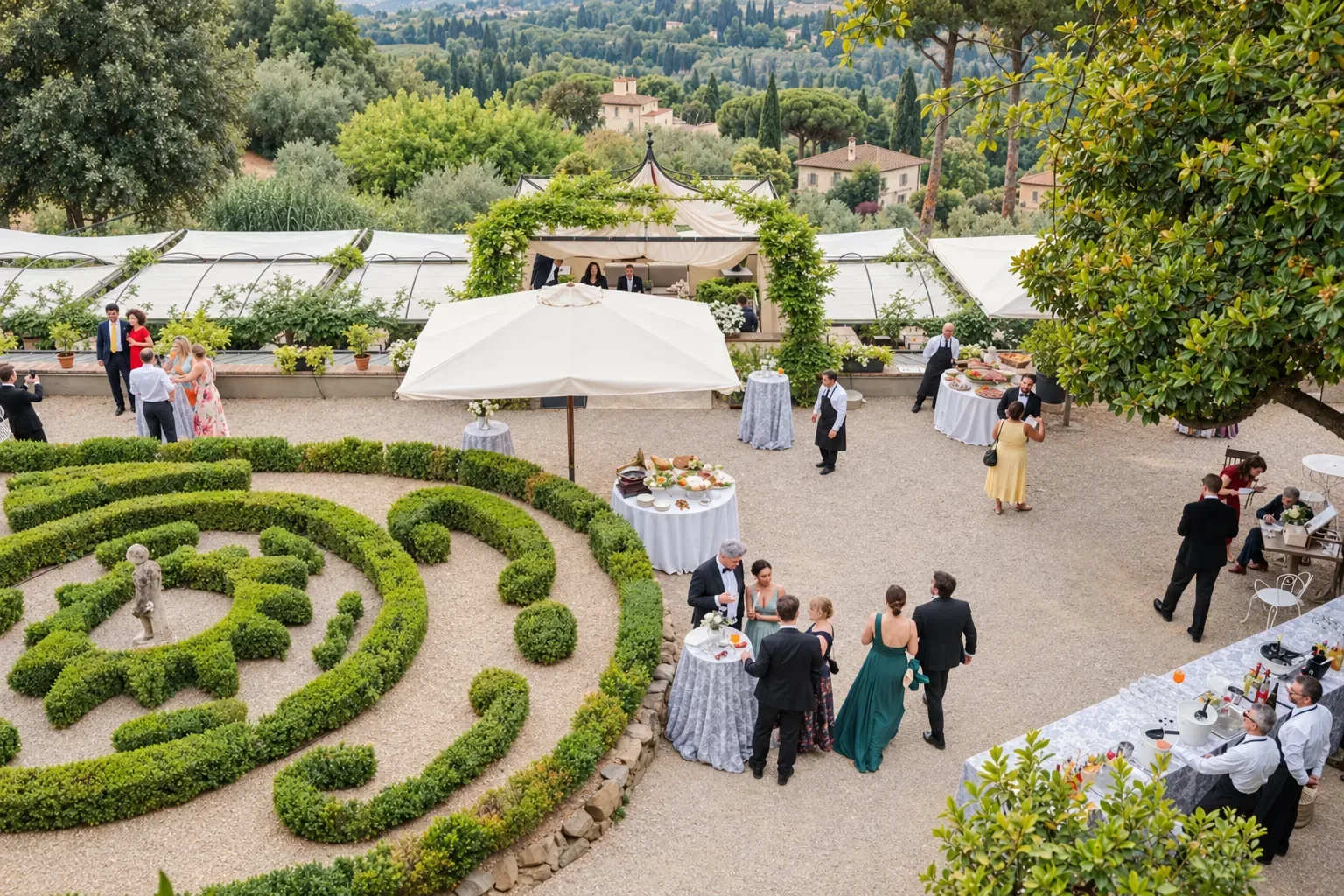 Wedding guests at drinks in a villa garden of clipped box hedges above Florence
